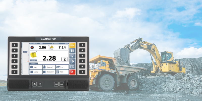 Image of the Loadex 100 superimposed on a background displaying an excavator and articulated dump truck (ADT), representing use in a civil market.