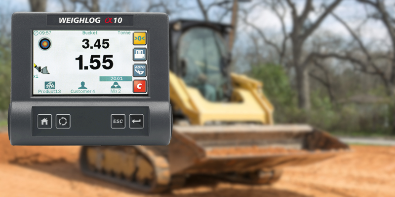 Image of the Weighlog Alpha 10 superimposed over an image of a skid steer.
